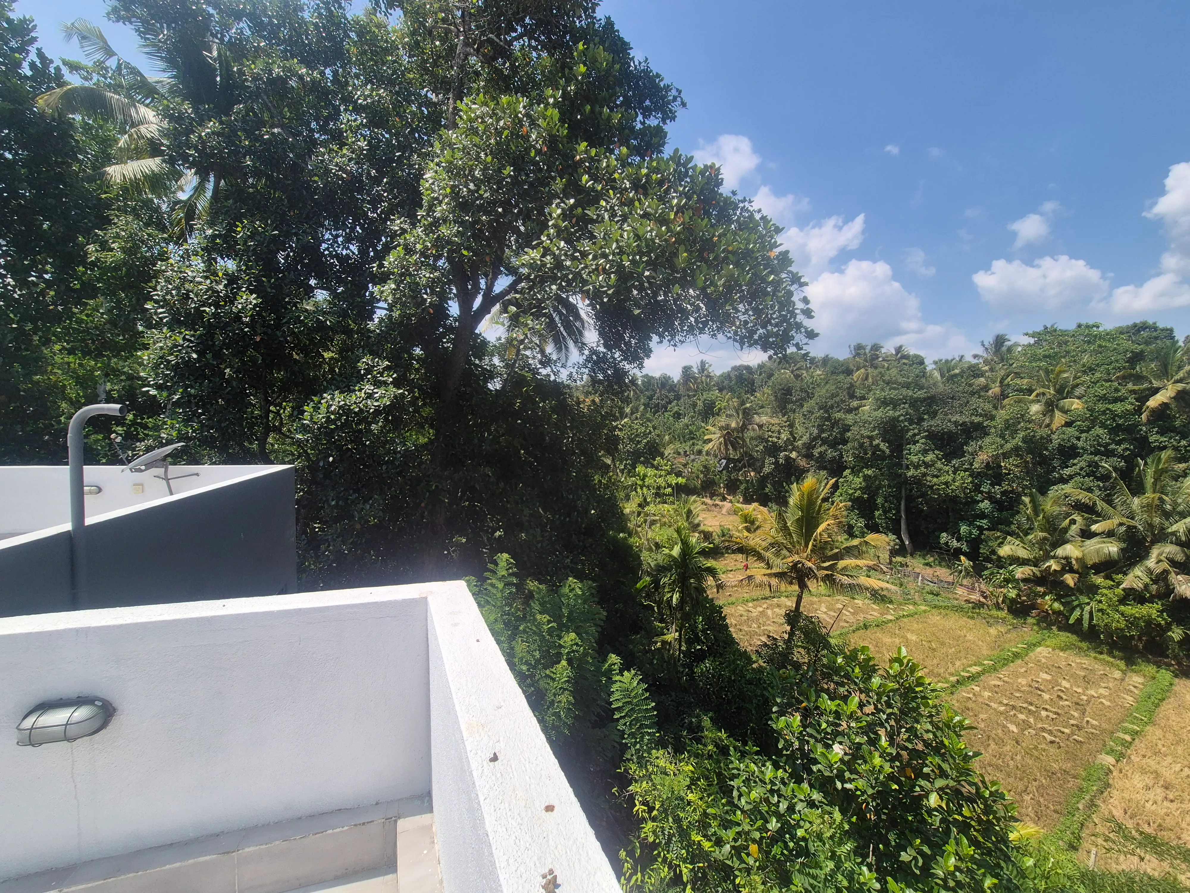 Rooftop outdoor space with mountain views at TenTwo private villa Kandy